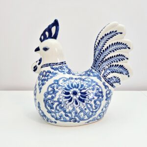 Hand-painted blue and white chinoiserie porcelain rooster figurine with classic motif